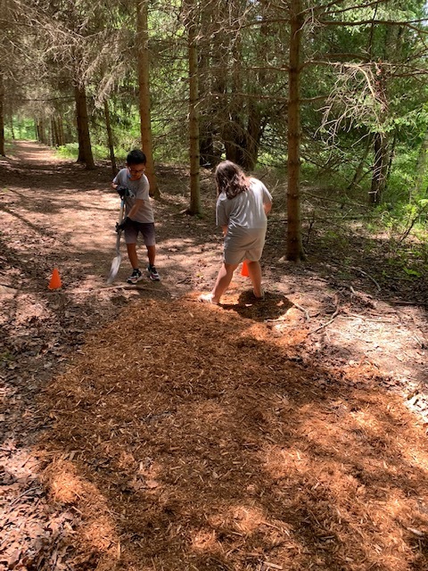 Repairing the damage to nature trail.
